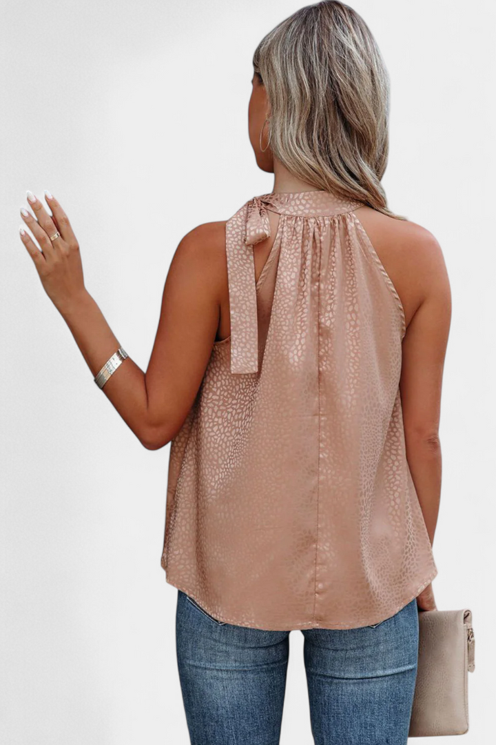 Adela | Vestido de leopardo sem mangas com gola alta e laço