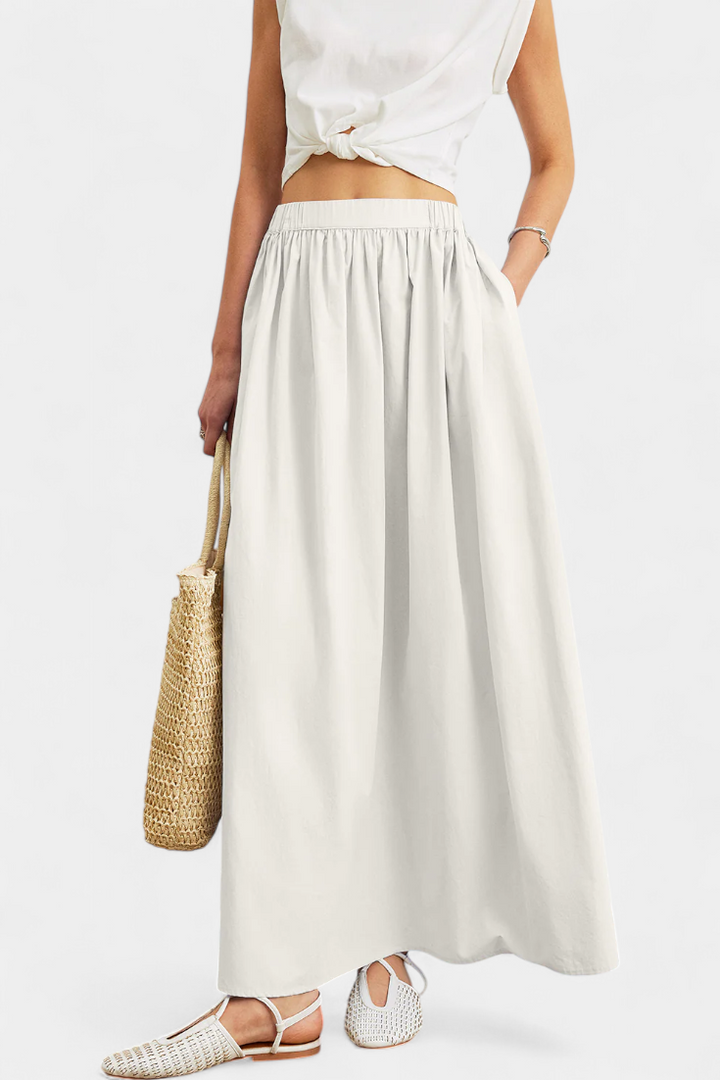 Saias Yora em A com cintura elástica e bolsos