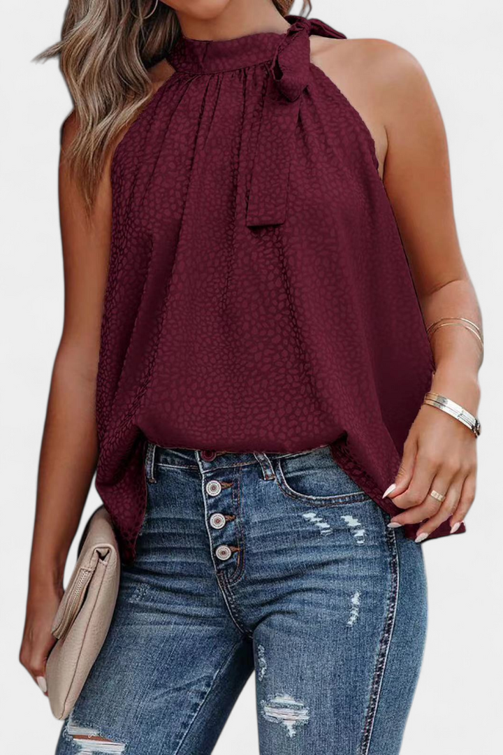 Adela | Vestido de leopardo sem mangas com gola alta e laço