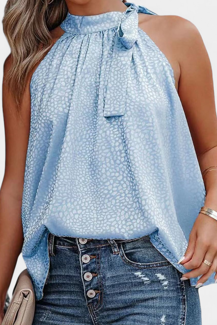 Adela | Vestido de leopardo sem mangas com gola alta e laço