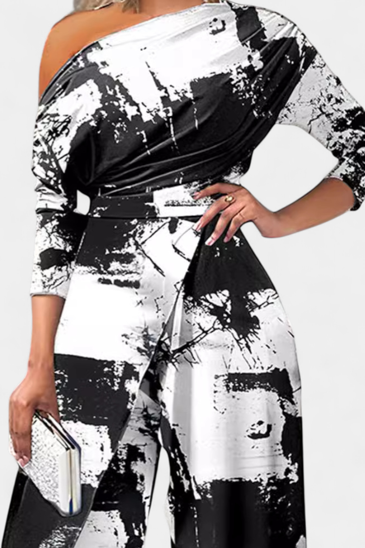 Brina Mono Largo em Transição de Cores com Ombros Descobertos e Pernas Largas com Abertura